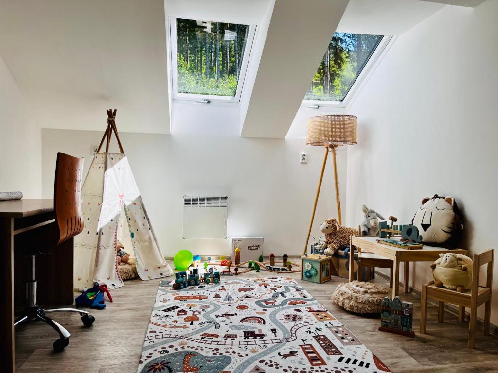 Dětský koutek s teepee a hračkami